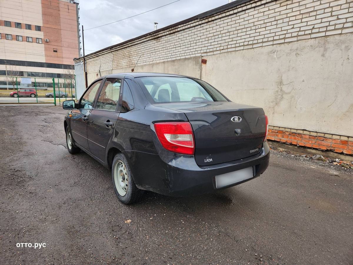 Купить LADA (ВАЗ) Granta I седан, 2013 года, цвет: Черный, за 440000 руб. в  Санкт-Петербурге